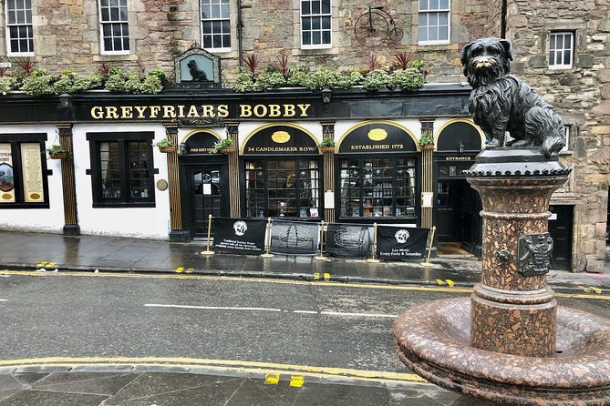 Essential Walking Tour of Edinburgh's Old Town - Mercat Cross reveals the public life of the Royal Mile
