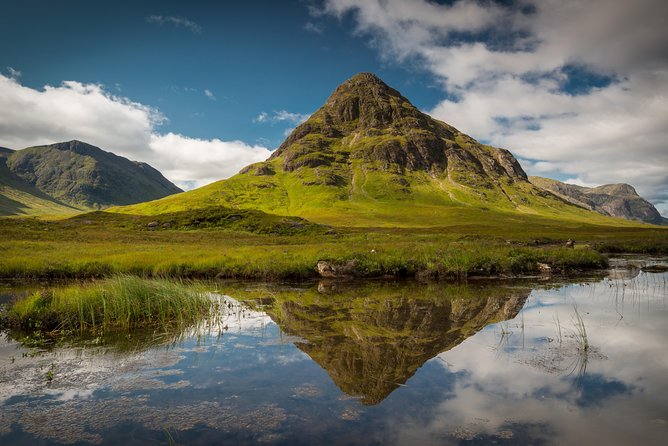 Oban, Glencoe, Highlands Lochs & Castles Small Group Day Tour from Glasgow - Loch Lomond begins the scenic route