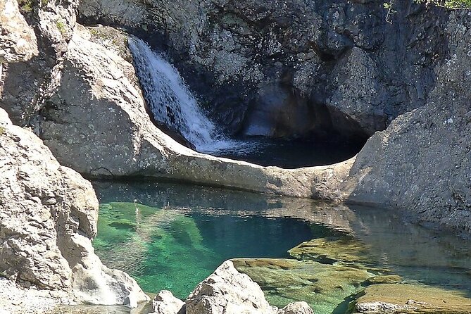 Private Tour to Skye, Fairy Pools, Portree and The Fairy Glen - Eilean Donan Castle: a strong opening photo stop